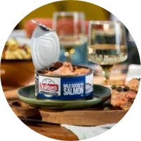 open can of salmon on table